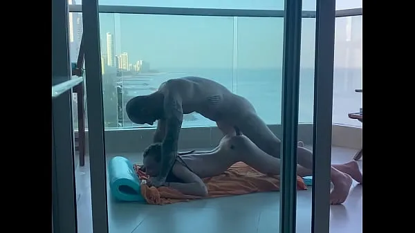 On a balcony in Cartagena, a young student gets her pretty little ass filled Video hay nhất